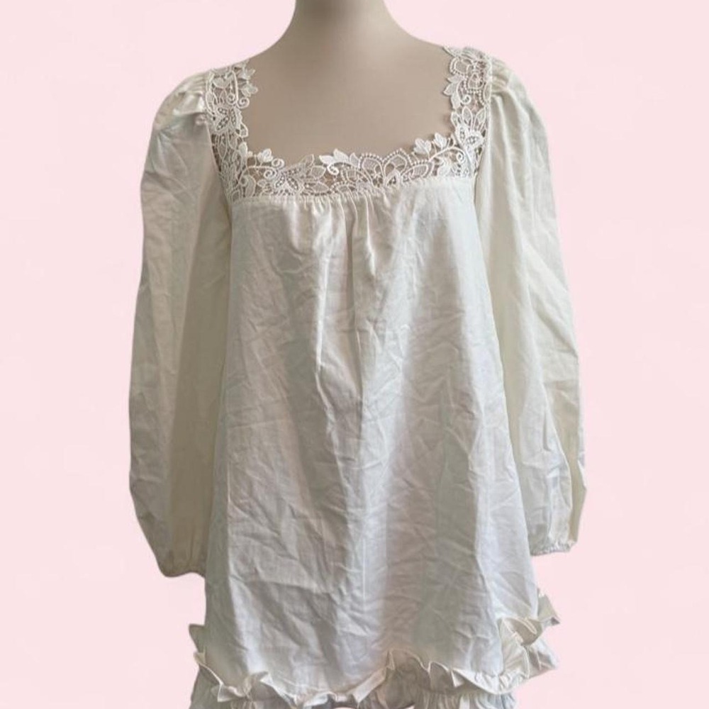 Fashion Nova white lace babydoll dress with ruffled hem and long sleeves, size S